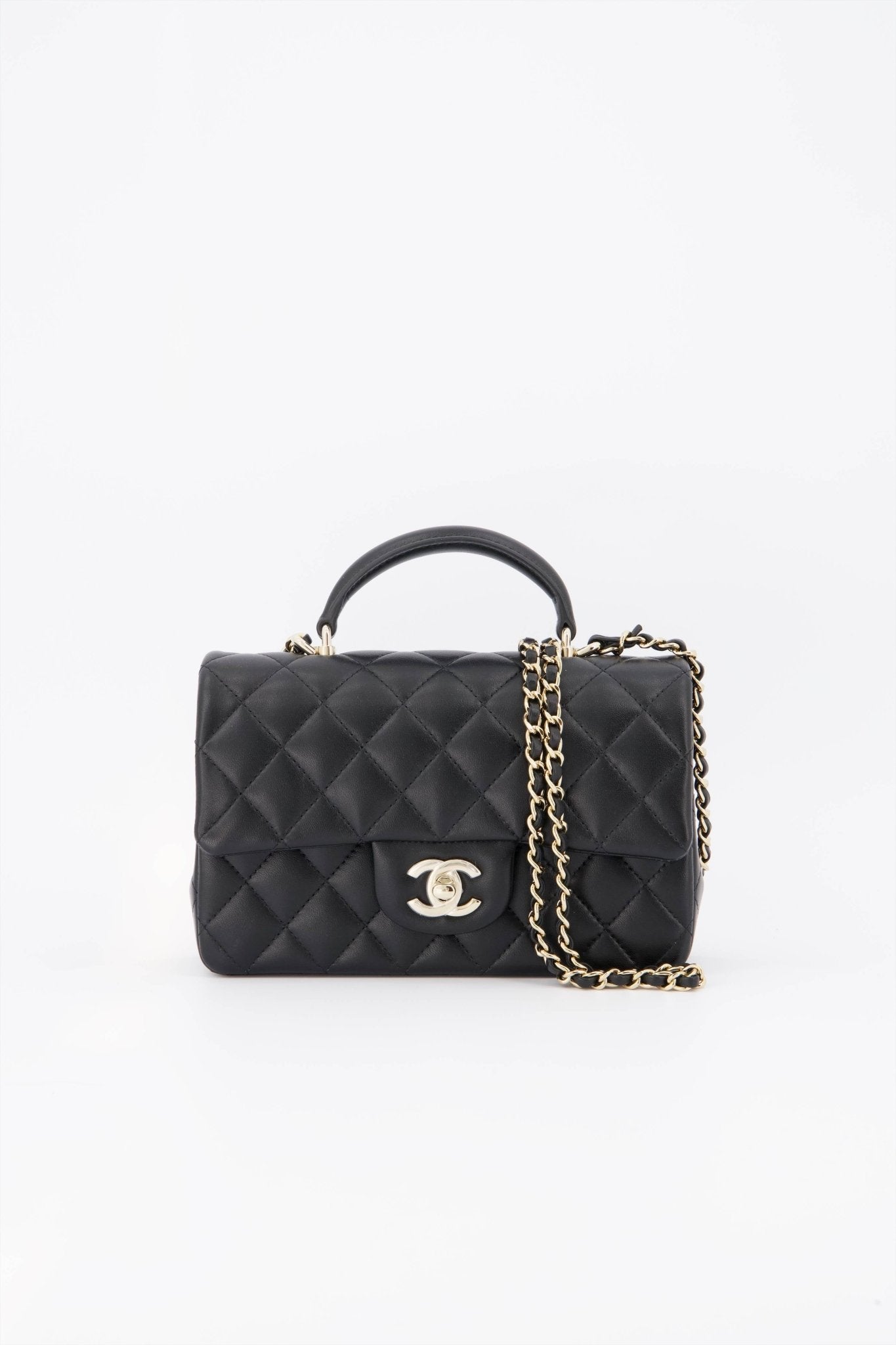 Chanel black flap online bag with top handle