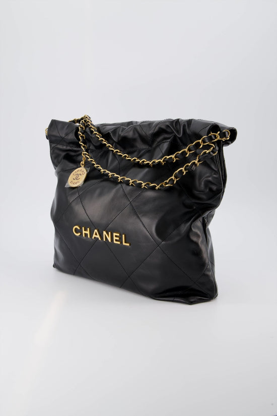 Large hobo bag, Shiny crumpled lambskin & gold-tone metal, red — Fashion